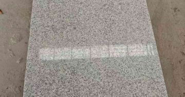 自贡芝麻白光面毛板